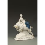 KATZHUTTE: A PORCELAIN BLANC DE CHINE MODEL OF A CLASSICAL NUDE RIDING A BULL with teal and gilt