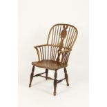 A WINDSOR HOOP BACK ARMCHAIR with elm seat and turned legs, 19th century, 40" high
