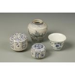 FOUR MINIATURE CHINESE BLUE AND WHITE WARES: a jarlet, two octagonal Hoi An boxes, and a wine cup,