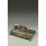 A REGENCY MARBLE AND ORMOLU INK WELL, with entwined serpent handle, 13.5" wide