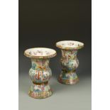 A PAIR OF CHINESE FAMILLE ROSE SPITTOONS decorated with figures and garden scenes, Qing, 19thC, 12.