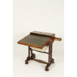 A MAHOGANY FOLDING WRITING DESK AND WORK TABLE, the folding top above an upholstered basket on
