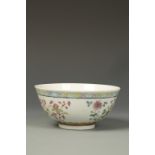 A CHINESE FAMILLE ROSE BOWL decorated with flowers, Guangxu mark and period, 5" dia.