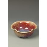 A CHINESE SHIWAN FLAMBE BOWL, of petal form, Qing, 19thC, 6.25" dia.