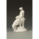 KATZHUTTE: A BLANC DE CHINE PORCELAIN MODEL OF A CLASSICAL NUDE seated on a polar bear, with gilt