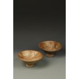 A PAIR OF TERRACOTTA FOOTED BOWLS, probably Pre-Columbian, with geometric decoration, 7.5" (2)