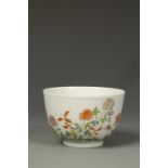 A CHINESE ENAMELLED WINE CUP decorated with flowers, 'Shen De Tang' mark, probably 20thC, 3" dia.