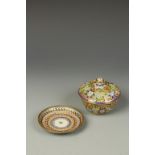 A CHINESE PLIQUE-A-JOUR BOWL AND SAUCER decorated with flowerheads and tendrils, late Qing/Republic,
