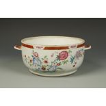 A CHINESE FAMILLE ROSE TUREEN decorated with flowers in a garden, Qing, 18thC, 11" wide