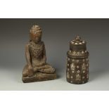A SOUTHEAST ASIAN CARVED WOOD BUDDHA, 11" high; and a Himalayan wood and bone inlaid cylindrical