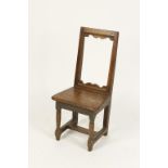 A CHARLES II OAK BACK STOOL with solid seat and turned legs, 32" high  Provenance: The Private