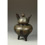 A CHINESE BRONZE AND CHAMPLEVE TRIPOD CENSER with flared handles, Qing, 18th/19thC, 12.5" high