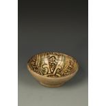 A NISHAPUR STYLE BOWL, decorated in brown pigments with spotted designs, 8" dia.