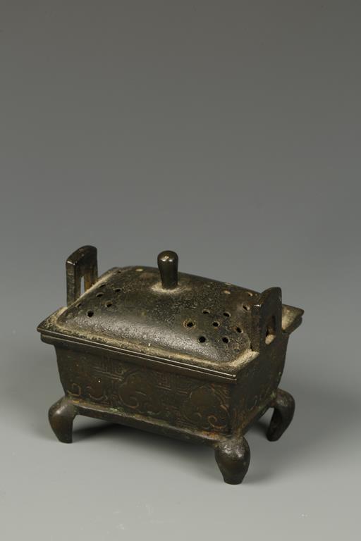 A CHINESE BRONZE MINIATURE CENSER of rectangular form, late Ming/Qing, 3" long