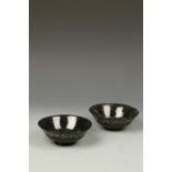A PAIR OF ISLAMIC HARDSTONE CALLIGRAPHIC BOWLS, probably Sufi, 5" dia (2)