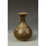 A THAI SAWANKHALOK BOTTLE VASE with a brown glaze, c.15thC, 7" high