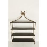 A SET OF REGENCY STYLE EBONISED AND GILT METAL WALL SHELVES with rope effect metal supports, 31"