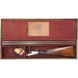 A DAMASCUS BARRELLED SIDE BY SIDE 12-BORE SHOTGUN, in a Churchill case
This gun requires an