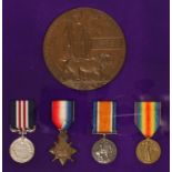 A GREAT WAR M.M. AND TRIO OF MEDALS WITH PLAQUE, awarded to Corporal Frederick Henry Higgins, 5th