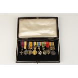 A MINIATURE MEDAL GROUP, MBE, Queen's Sudan, Great War pair, War and Victory (with oak leaf),