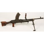 A DEACTIVATED SECOND WORLD WAR BREN MK II LIGHT MACHINE GUN, dated 1943, with magazine and tripod,