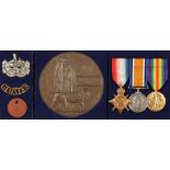 A GREAT WAR CASUALTY TRIO OF MEDALS AND PLAQUE, with tag and badges, awarded to Private Frederick