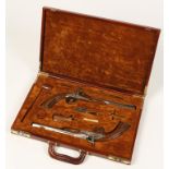 A PAIR OF DECORATIVE 18TH CENTURY STYLE PERCUSSION PISTOLS, with engraved steel furniture and