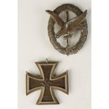 A NAZI BADGE, and Iron Cross medal. (2)