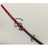 A JAPANESE KATANA, with red painted wood scabbard, 33"