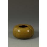 A SMALL CHINESE 'TEA-DUST' GLAZED WATER POT, Yongzheng period, 7.5cm diameter. Provenance: An