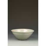 A KOREAN CELADON CONICAL BOWL, with a slightly everted rim and gently rounded body, the glaze an