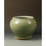 A LARGE CHINESE LONGQUAN CELADON JAR of baluster form, the exterior decorated with a band of