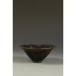 A CHINESE 'HARE'S FUR' GLAZED BOWL, of conical form with a metal-bound everted rim, the rich glaze