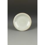 A SMALL CHINESE JUNYAO 'MOON WHITE' SAUCER DISH, the broad everted rim above a gently rounded