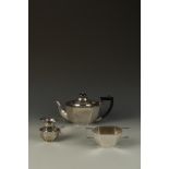 A THREE PIECE TEA SET of octagonal form, with angular handles, on a tucked-in foot, by W.A.,