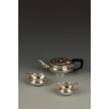 AN ART DECO THREE PIECE TEA SET of compressed circular form with angular handles, on tucked-in