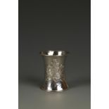 OMAR RAMSDEN: A NAPKIN RING of waisted cylindrical form, decorated with acorns and leaves,