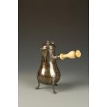 A FRENCH CHOCOLATE POT of baluster form, the hinged lid with disc finial, faceted spout and turned