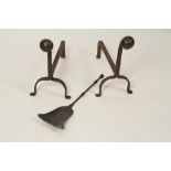 A PAIR OF ENGLISH IRON FIRE DOGS with ball terminals and simple "U"-shaped supports, 17th/18th