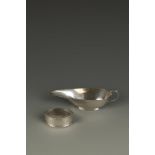 LIBERTY & CO: A NAPKIN RING of oval form with raised borders, dot frieze and hammered finish,