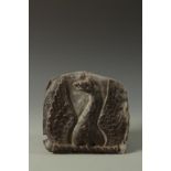 A LEAD PLAQUE cast with a phoenix with outspread wings, 18th century, 10" high