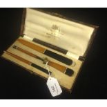 A 1920's 'Galalith' Bakelite desk set from the Hotel Cecil