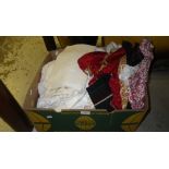 A quantity of vintage textiles including table cloths