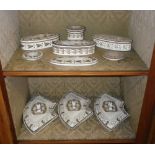A collection of 19th century ceramic dressing jars with hand painted decoration and three 19th