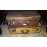 Two old leather travelling cases