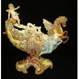 A large early 20th century German ceramic centrepiece decorated with a winged horse and figures