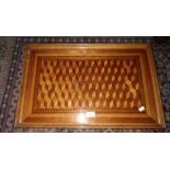 A late 19th century parquetry inlaid oak tray