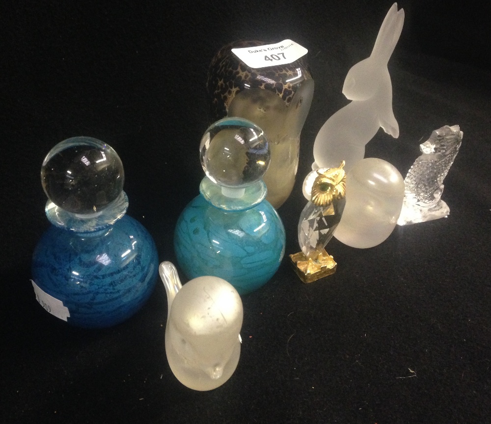 A collection of assorted glass ornaments and similar items