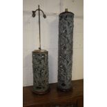 Two heavy cast-metal lamps with dragon decoration