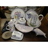 A Poole Pottery butter dish and other Poole china including table lamps, jugs and ornaments